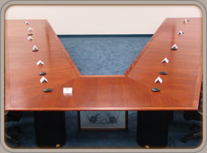 custom Honduran mahogany video conferencing table